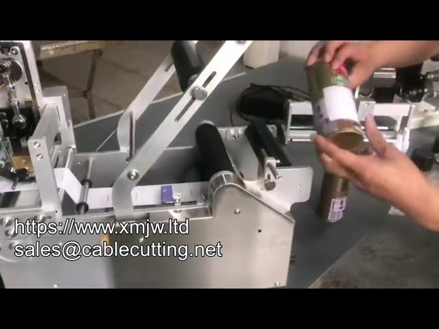 Étiqueteuse manuelle pour bouteilles rondes - Précision et fiabilité