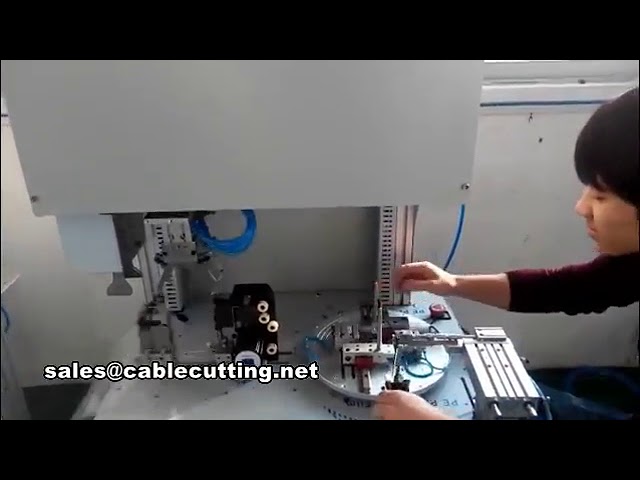 Machine automatique d'enroulement et de ligature pour petits câbles de souris