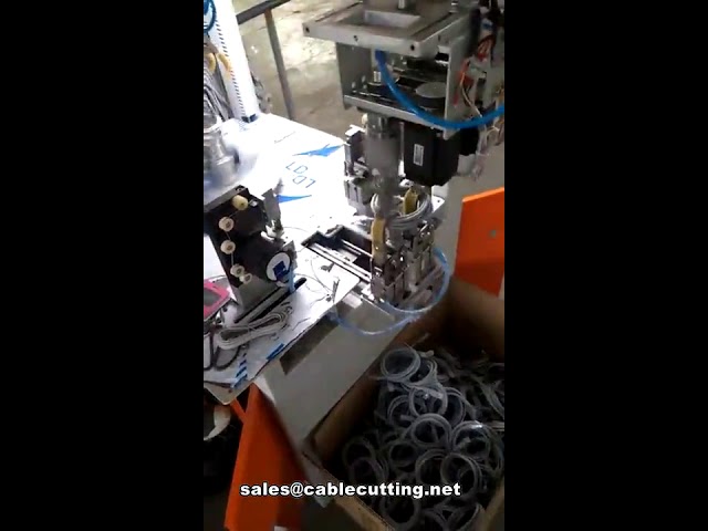 Machine automatique d'enroulement et de cerclage de câbles électriques avec pose de colliers